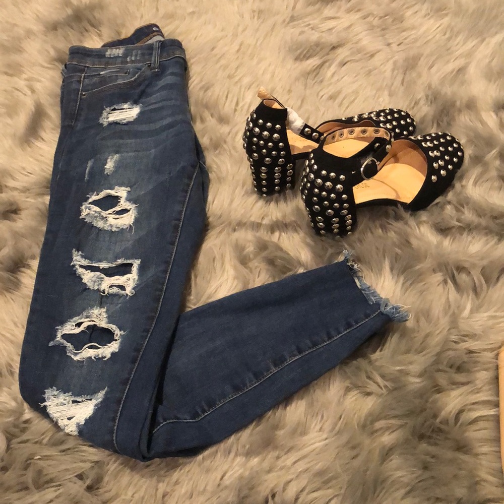 Never worn,  denim ripped jeans and frayed bottoms